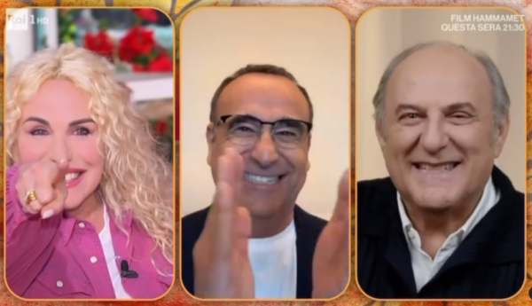 La videochiamata in diretta da parte di Carlo Conti ad Antonella Clerici a"E' mezzogiorno" su RaiUno, con Gerry Scotti in collegamento per annunciare la loro presenza come co-conduttori durante la prima serata del Festival di Sanremo l'11 febbraio